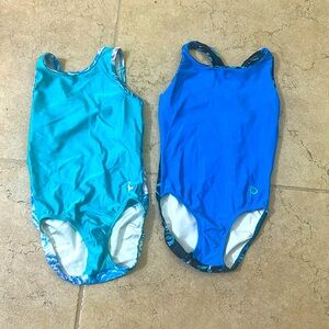 Two leotards. Plum size child Large